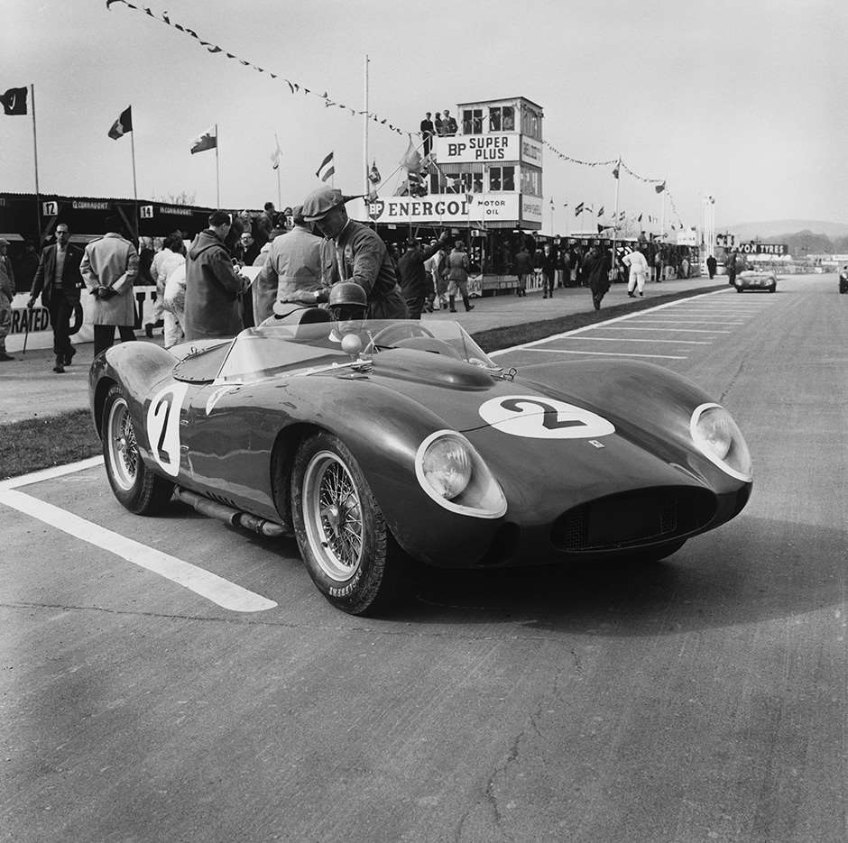 Goodwood, Sussex, Great Britain. Easter Monday, 7th April 1958. Peter Collins (Ferrari Dino 206 S), 2nd position,  on the grid before the start, portrait.  World Copyright: LAT Photographic. Ref:  2858.